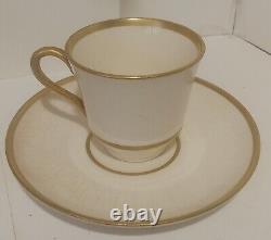 18k. Gold Demitasse Cups And Saucers