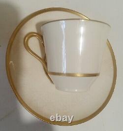18k. Gold Demitasse Cups And Saucers