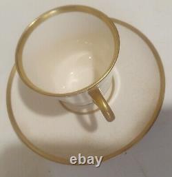 18k. Gold Demitasse Cups And Saucers