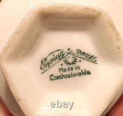 1920's Demitasse set. 8 cups/saucers. Encrusted gold. Porzellan Karlsbader. MINT