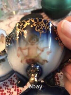 5- Flo Blue Cherubs? Demitasse cup and saucers Victoria Carlsbad? Austria