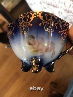 5- Flo Blue Cherubs? Demitasse cup and saucers Victoria Carlsbad? Austria