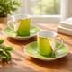 A Pair Of Christian Lacroix France Follement Green Demitasse Cup And Saucer Set