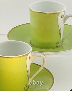 A Pair of Christian Lacroix France Follement Green Demitasse Cup and Saucer Set