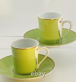 A Pair of Christian Lacroix France Follement Green Demitasse Cup and Saucer Set
