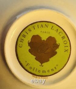 A Pair of Christian Lacroix France Follement Green Demitasse Cup and Saucer Set