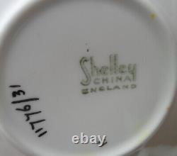 A Shelley Art Deco Chevron Handle 11776 Vogue coffee / demitasse cup & saucer