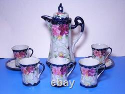 Antique chocolate pot set with five demitasse cups and two saucers Nippon