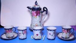 Antique chocolate pot set with five demitasse cups and two saucers Nippon
