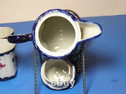 Antique chocolate pot set with five demitasse cups and two saucers Nippon