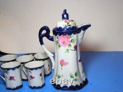 Antique chocolate pot set with five demitasse cups and two saucers Nippon