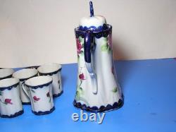 Antique chocolate pot set with five demitasse cups and two saucers Nippon