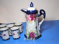 Antique chocolate pot set with five demitasse cups and two saucers Nippon