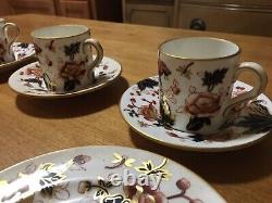 Coalport demitasse cups, saucers and dessert plates. 4 sets. Made in England