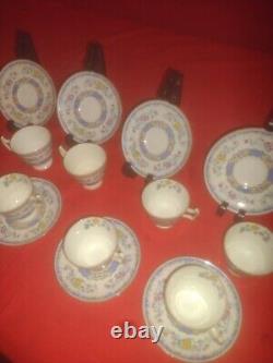 Footed Royal Morella Blue Demitasse Cups And Saucers