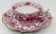 Meissen, Germany Indian Pink Flower Scalloped Oval Demitasse Cup & Saucer Set