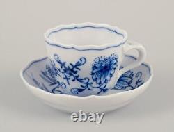 Meissen, Germany. Set of four Blue Onion pattern demitasse cups with saucers