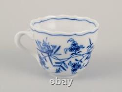 Meissen, Germany. Set of four Blue Onion pattern demitasse cups with saucers