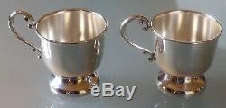 Pair of Cartier Sterling 601 Demitasse Cups & Saucers with 4 Cartier Bags