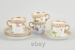 Royal Copenhagen. Four Flora Danica style demitasse cups with saucers. Ca. 1950