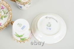 Royal Copenhagen. Four Flora Danica style demitasse cups with saucers. Ca. 1950