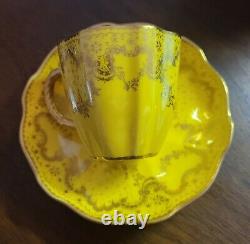 Royal Crown Derby Demitasse cup and saucer Gold on Yellow