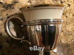 Set of 4 Antique Sterling Demitasse cup holders with saucers and porcelain cups