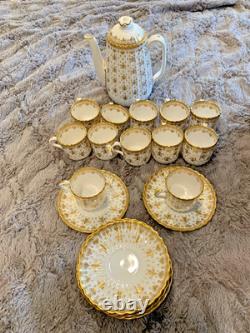 Spode Fleur de lys gold demitasse 12 cup saucer set coffee and teapot. Unused