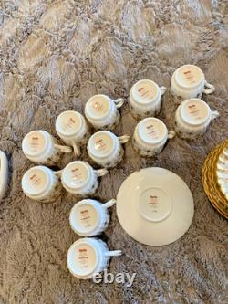 Spode Fleur de lys gold demitasse 12 cup saucer set coffee and teapot. Unused