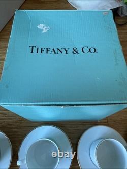 Vintage Tiffany & Co. Demitasse Cup (4)and Saucers (4). White + Gold Rim + Box