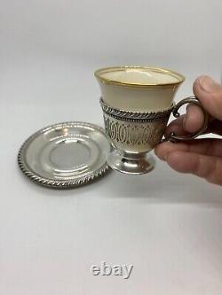Vintage sterling silver and china demitasse cups and saucers. Service for 8