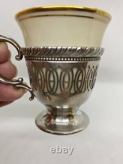 Vintage sterling silver and china demitasse cups and saucers. Service for 8